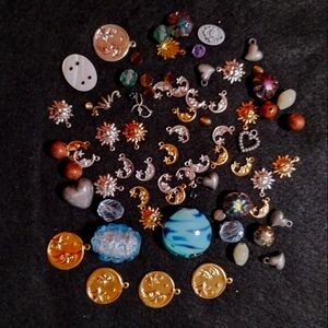 Variety Of Beads And Charms For Making Jewelry